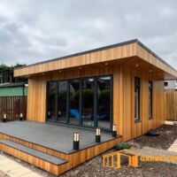 garden room with extended deck and lights